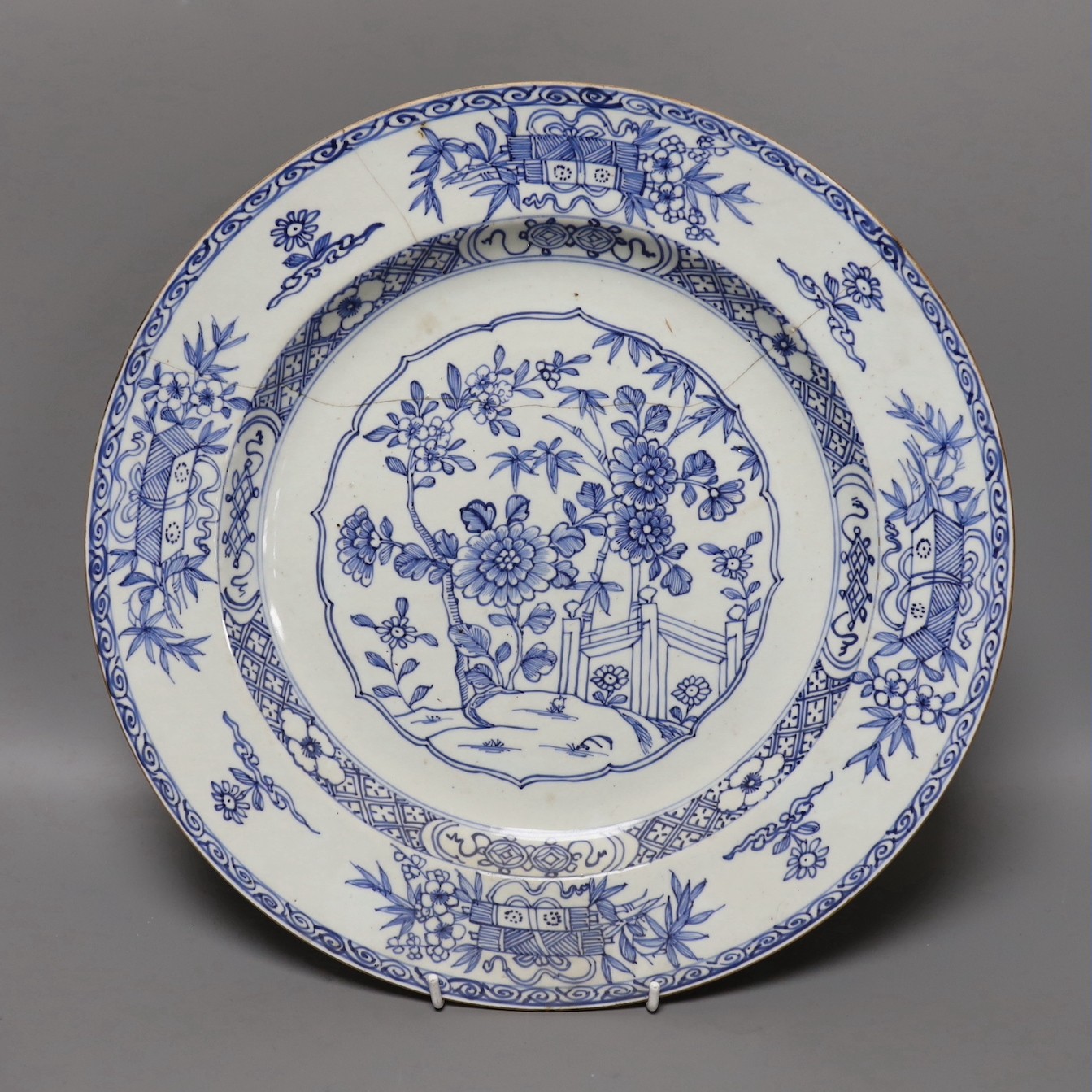 Three Chinese export blue and white dishes, 18th/19th century, largest 42 cms wide